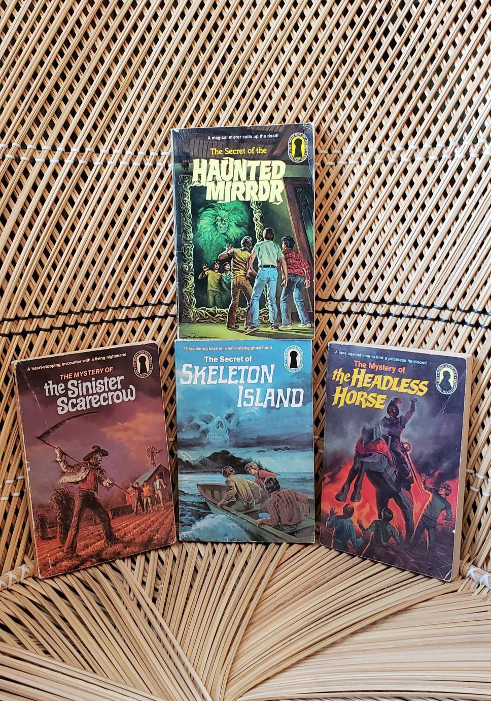 1985 The Three Investigators Mystery Set of 4 Paperbacks Skeleton Island The Haunted Mirror The Headless Horse The Sinister Scarecrow by Alfred Hitchcock - Image 2