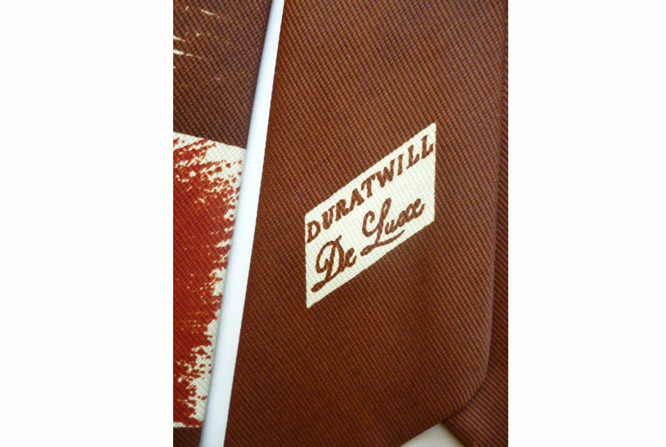40s Geometric Swing Wide Tie In Brown and Burnt Sienna by De Luxe Dura Twill Sold In Winans Norwich Ny by De Luxe Dura Twill - Image 3
