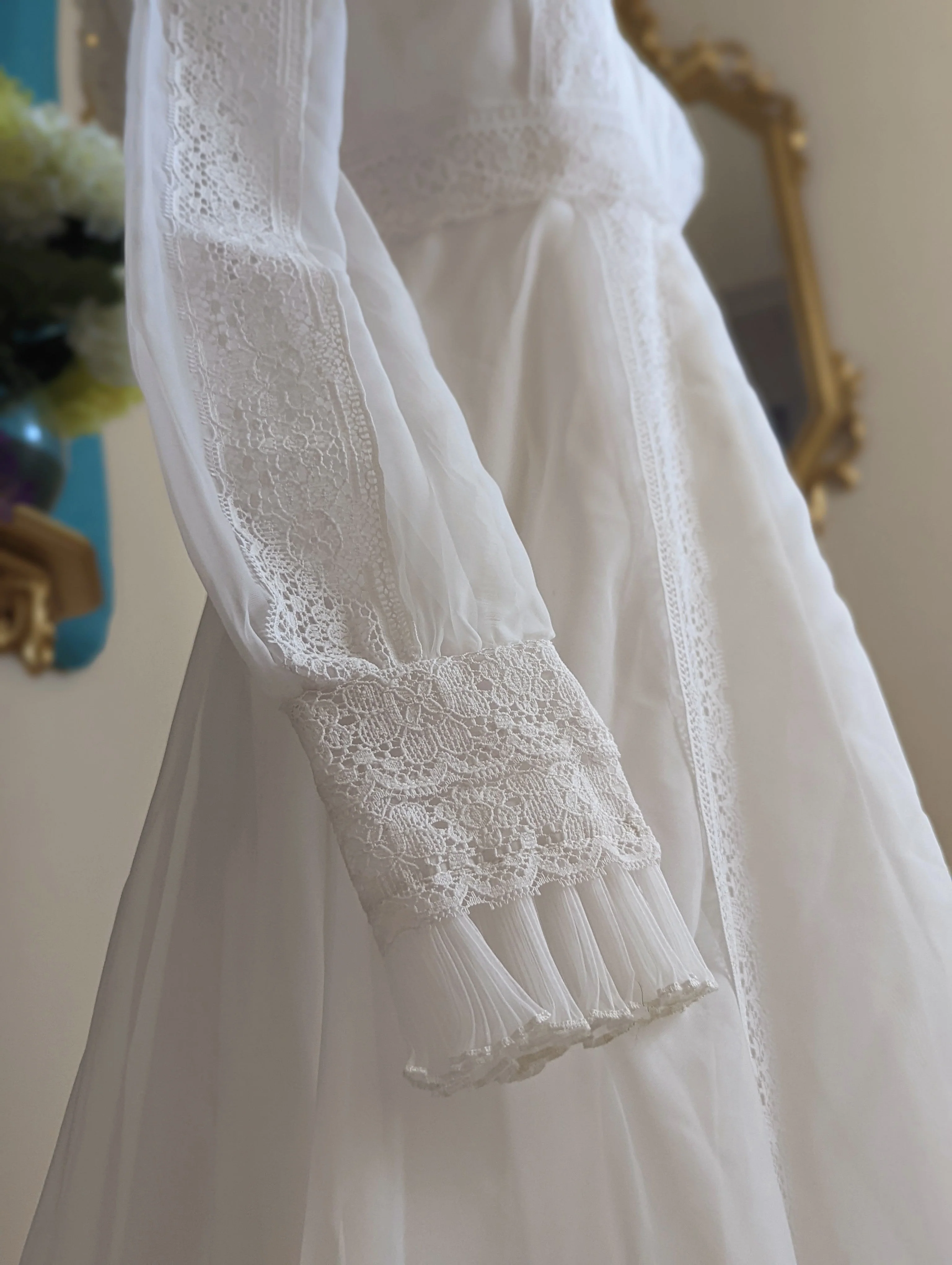 70s Victorian Inspired Bright White Wedding Dress with High Collar Empire Waist, Pleated Shoulder Accents, Detailed Lace, Long Sleeves, and Hand Sewn Beads - Image 11