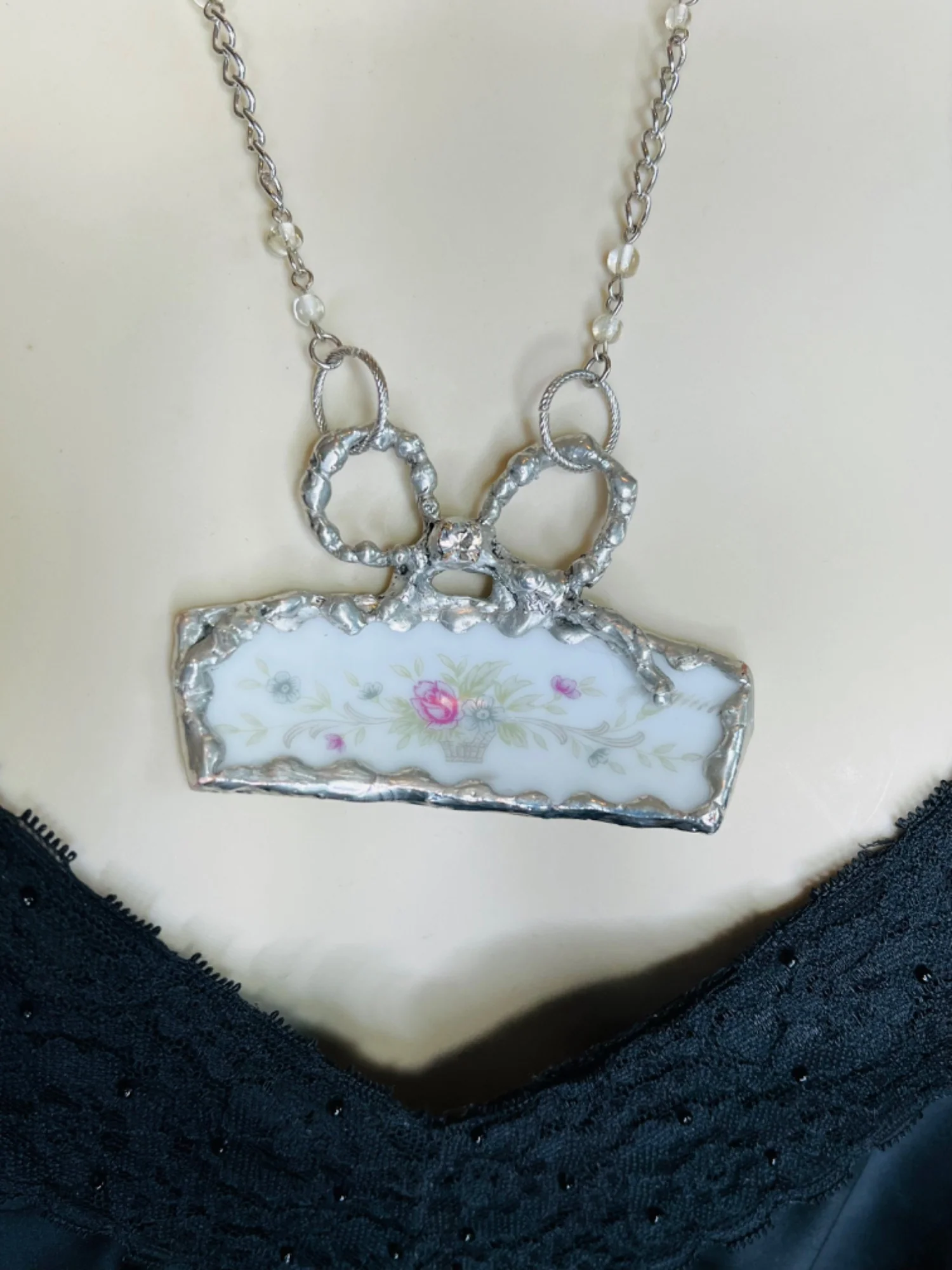 Handmade Broken China Pendant Necklace Caged In a Soldered Bow by Broken China Necklace - Image 3