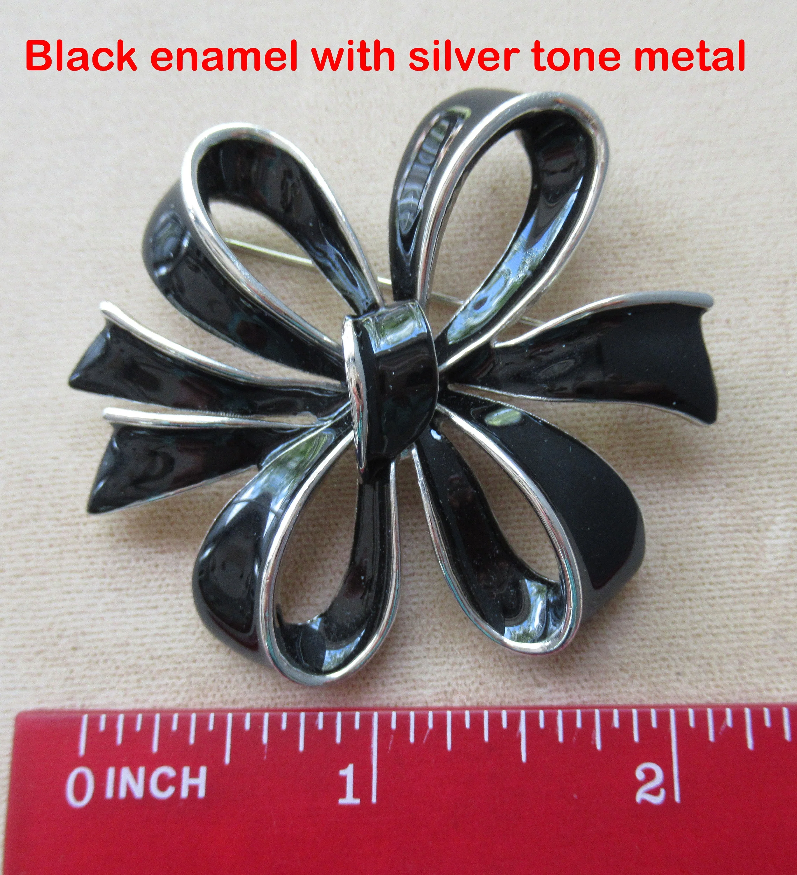 Tied Bow Style Brooch Black Enamel and Silver Tone Edge Unsigned 2 and 1/4 by 2 and 1/4 Inch Rolling C Back Clasp Classic Style / Color - Image 2