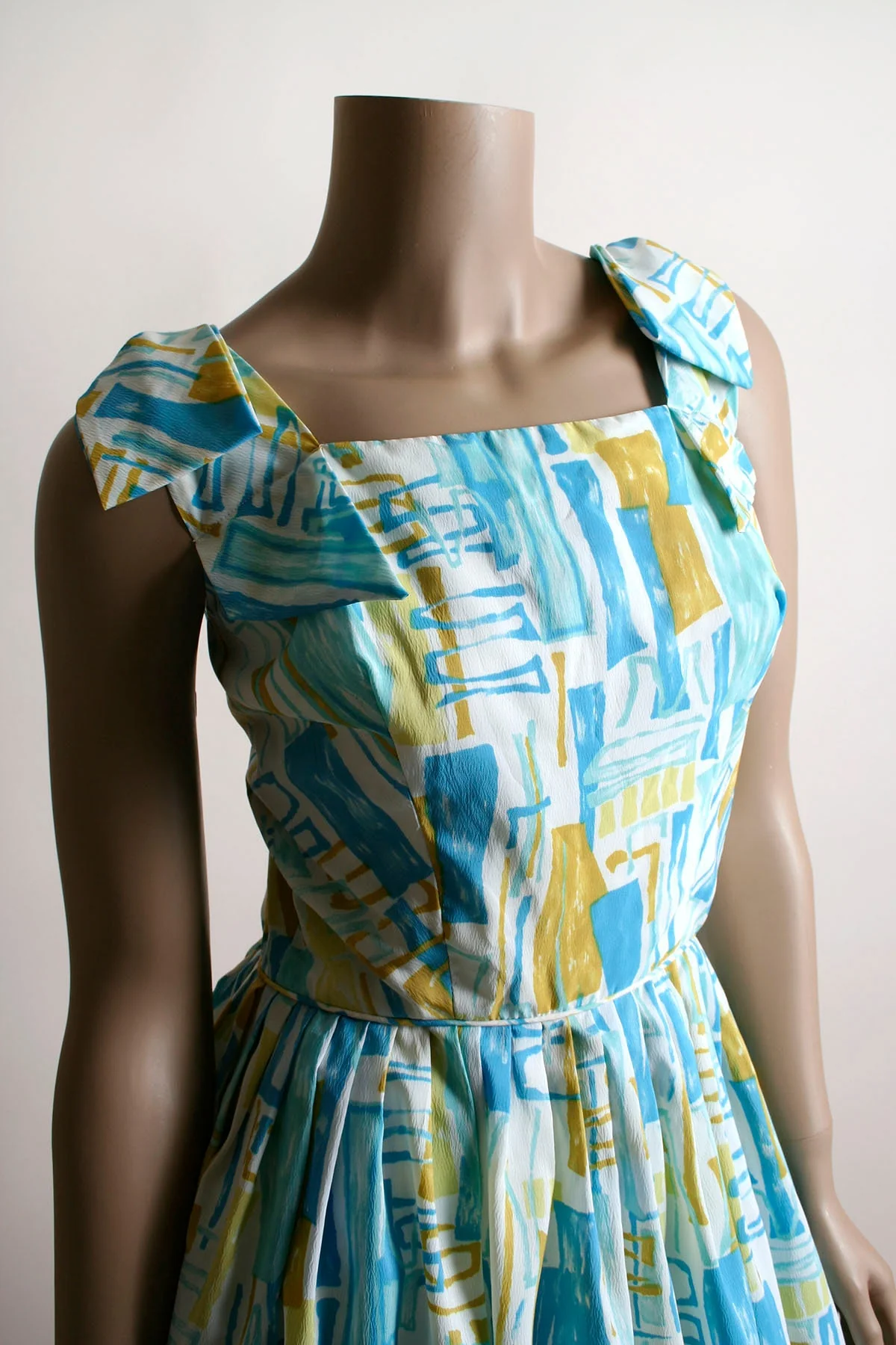 Vintage 60s Dress Aquamarine and Yellow Abstract Print Crepe Day Dress with Bow Shoulders Print Fit N Flare Small - Image 4